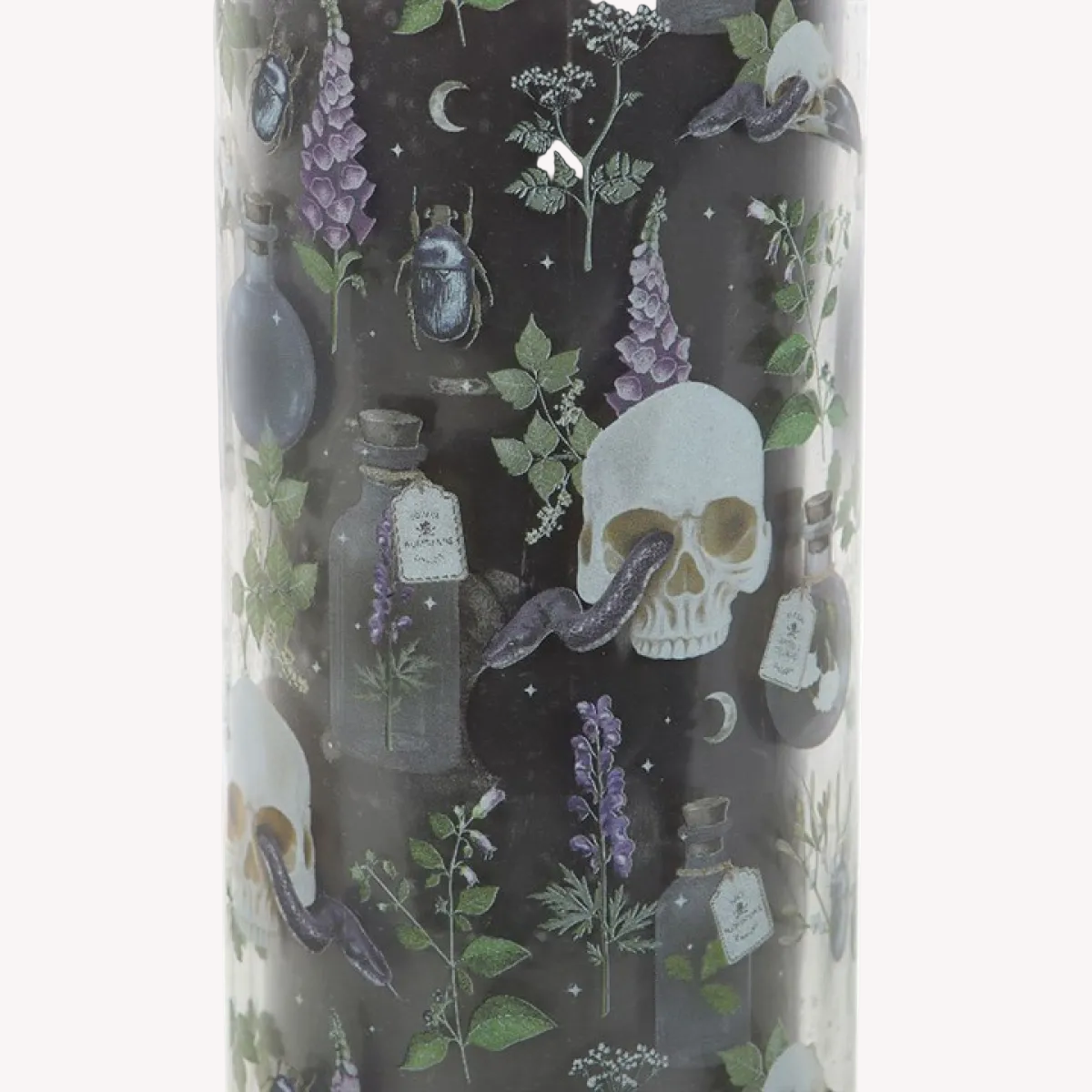 Tall cylindrical container with a skull and nature-themed design on a black background