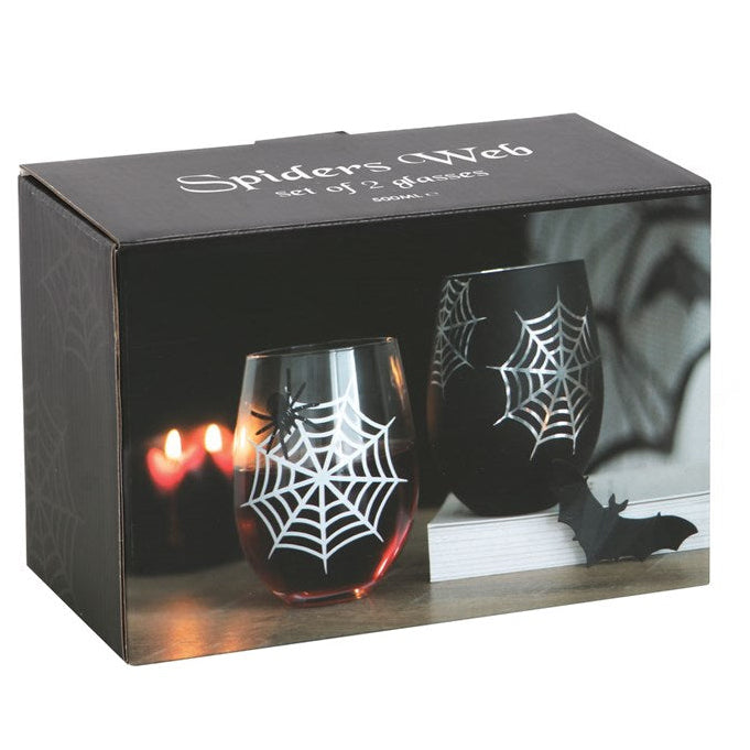 Set of two Halloween-themed stemless wine glasses with spider web design in packaging.