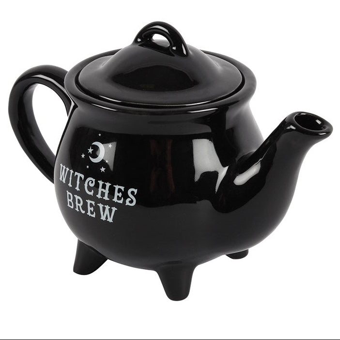 Black teapot with 'Witches Brew' text on a white background