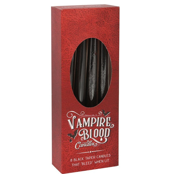 Red box of 'Vampire Blood' candles with a window showing the black candles inside.