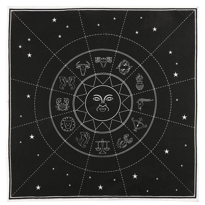 Black square cloth with white zodiac symbols and celestial design on a white background