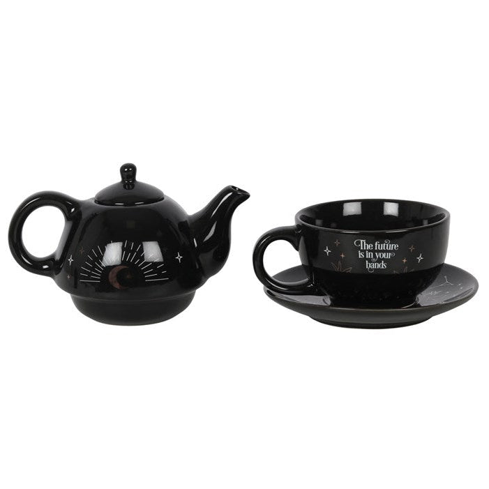 Black teapot and cup set with 'The future is in your hands' text on a white background