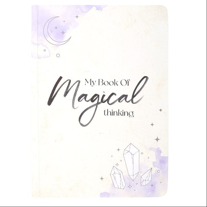 Book cover with 'My Book of Magical Thinking' text and crystal graphics on a white background