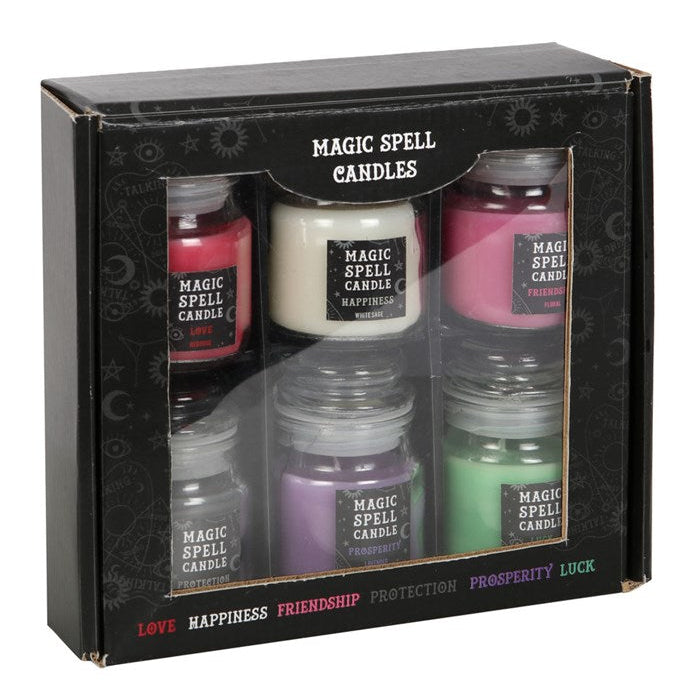 Set of 'Magic Spell Candles' in a packaging box with labels on a white background.