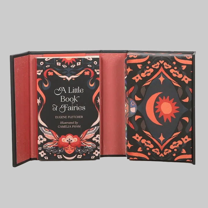 Decorative book titled 'A Little Book of Fairies' with ornate cover design.