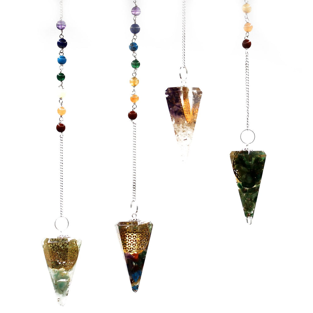 Set of four crystal pendulums with colorful beads on white background