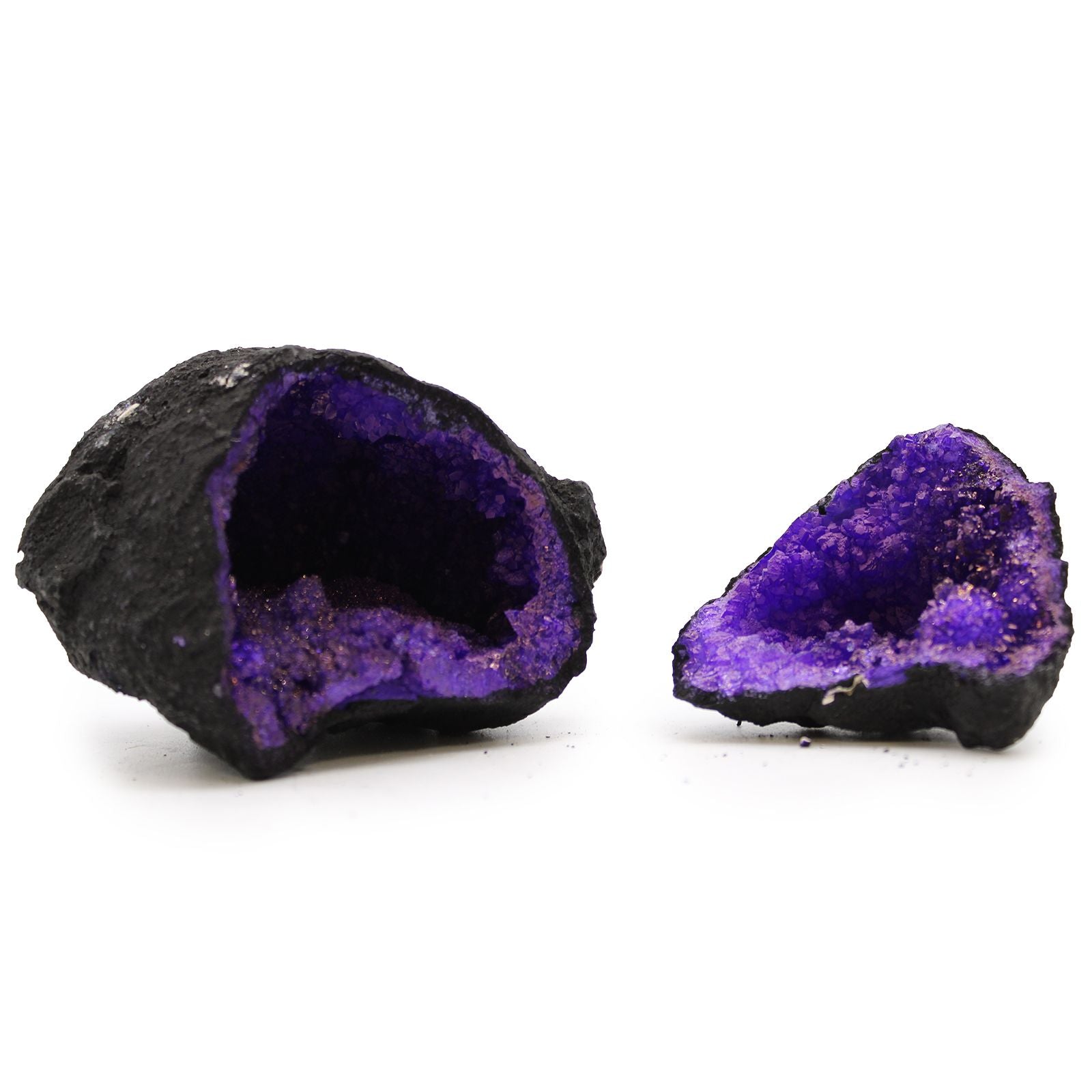 Two purple geode crystals on a white background