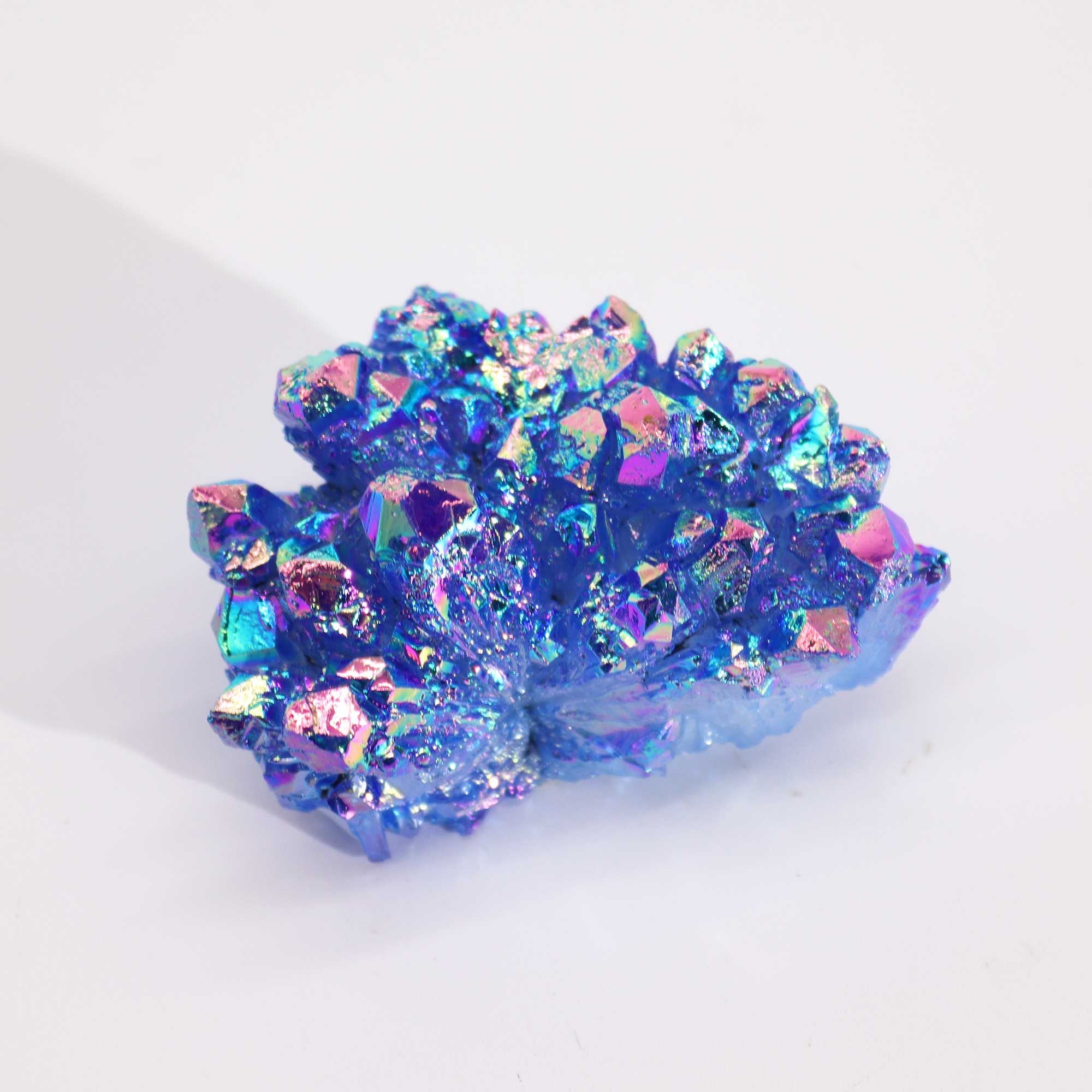 Multicolored crystal-like object on a white background