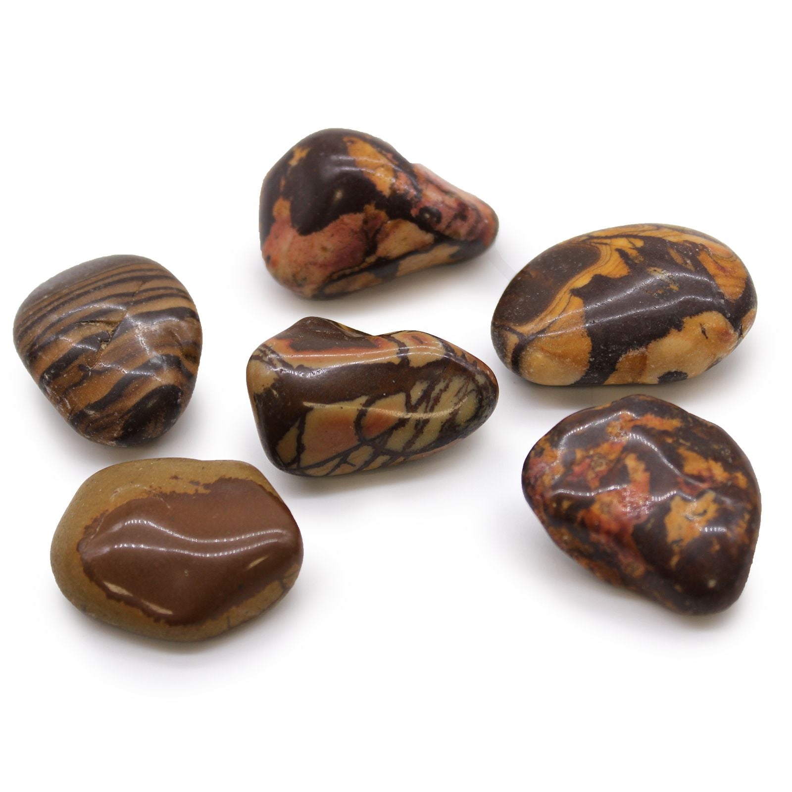 Marbled brown and orange stones on a white background