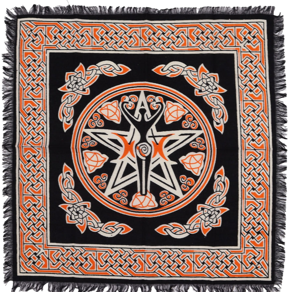 Decorative throw blanket with Celtic knot patterns and central design on a black background