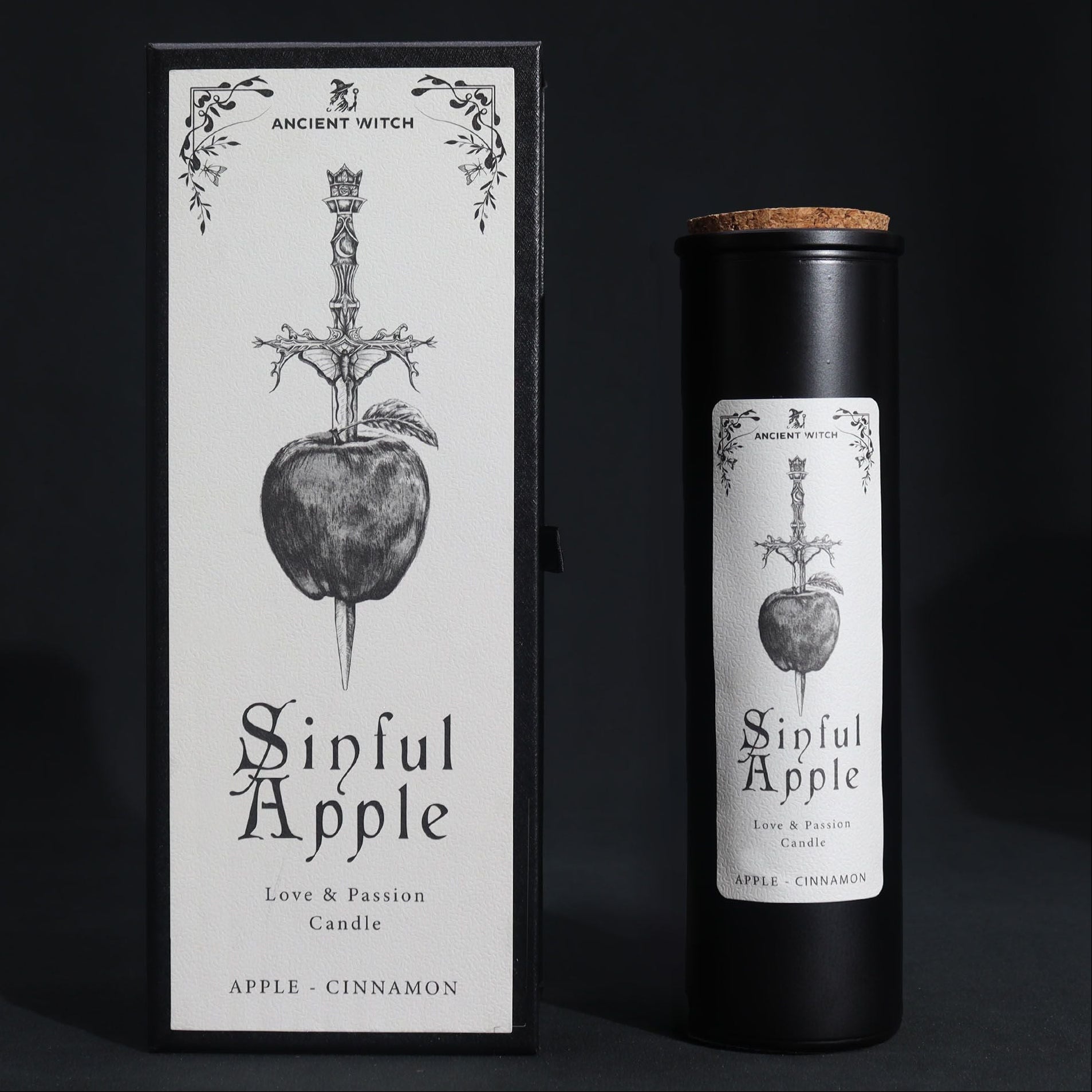 Candle packaging for 'Sinful Apple' with black and white design on a dark background