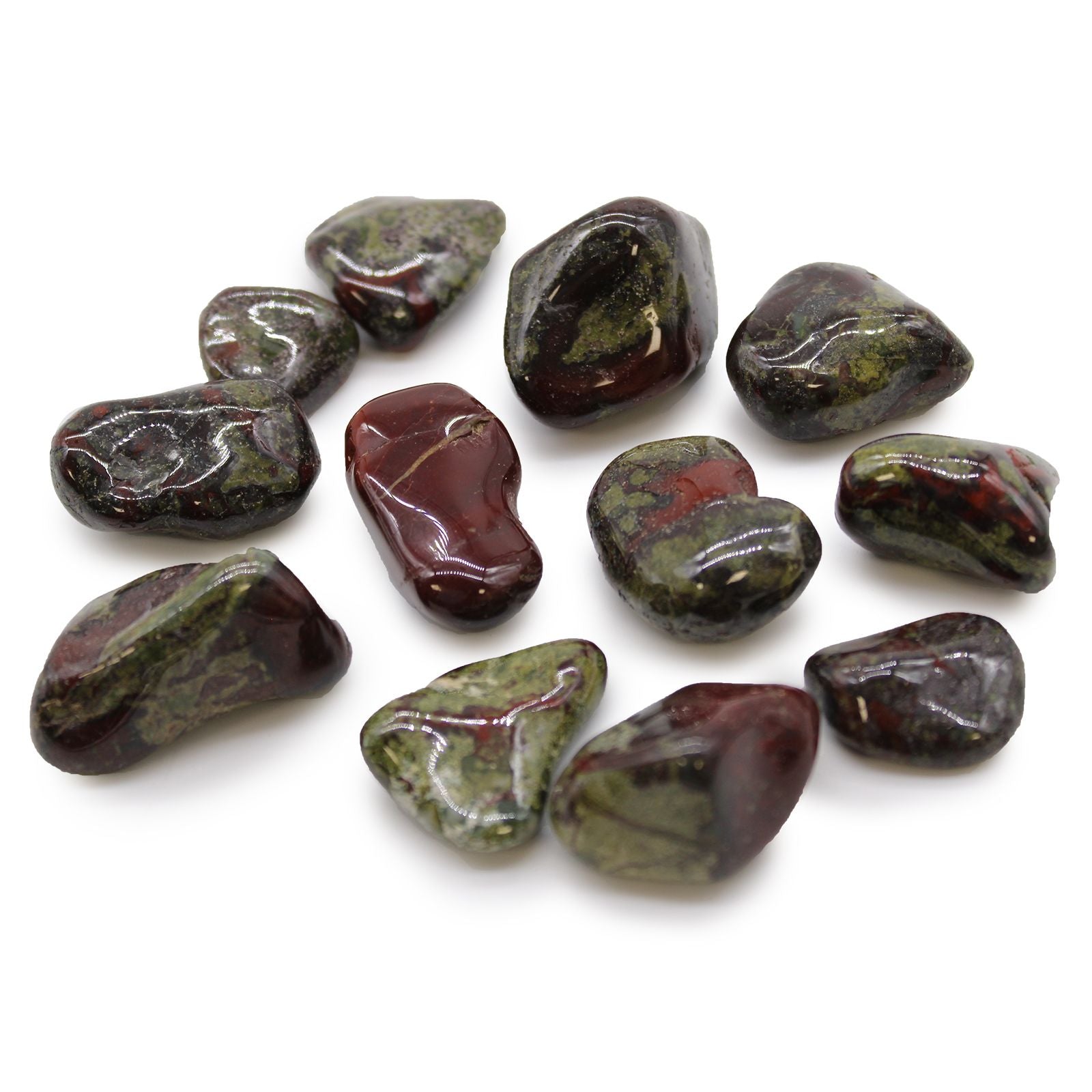 Collection of polished gemstones on a white background