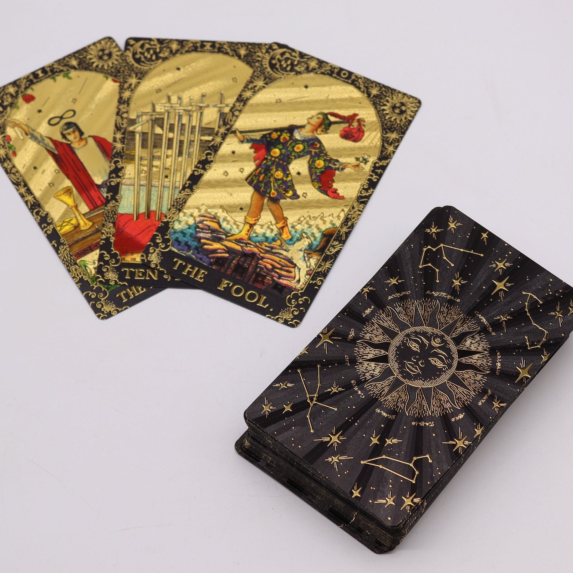 Tarot cards with intricate designs on a white background