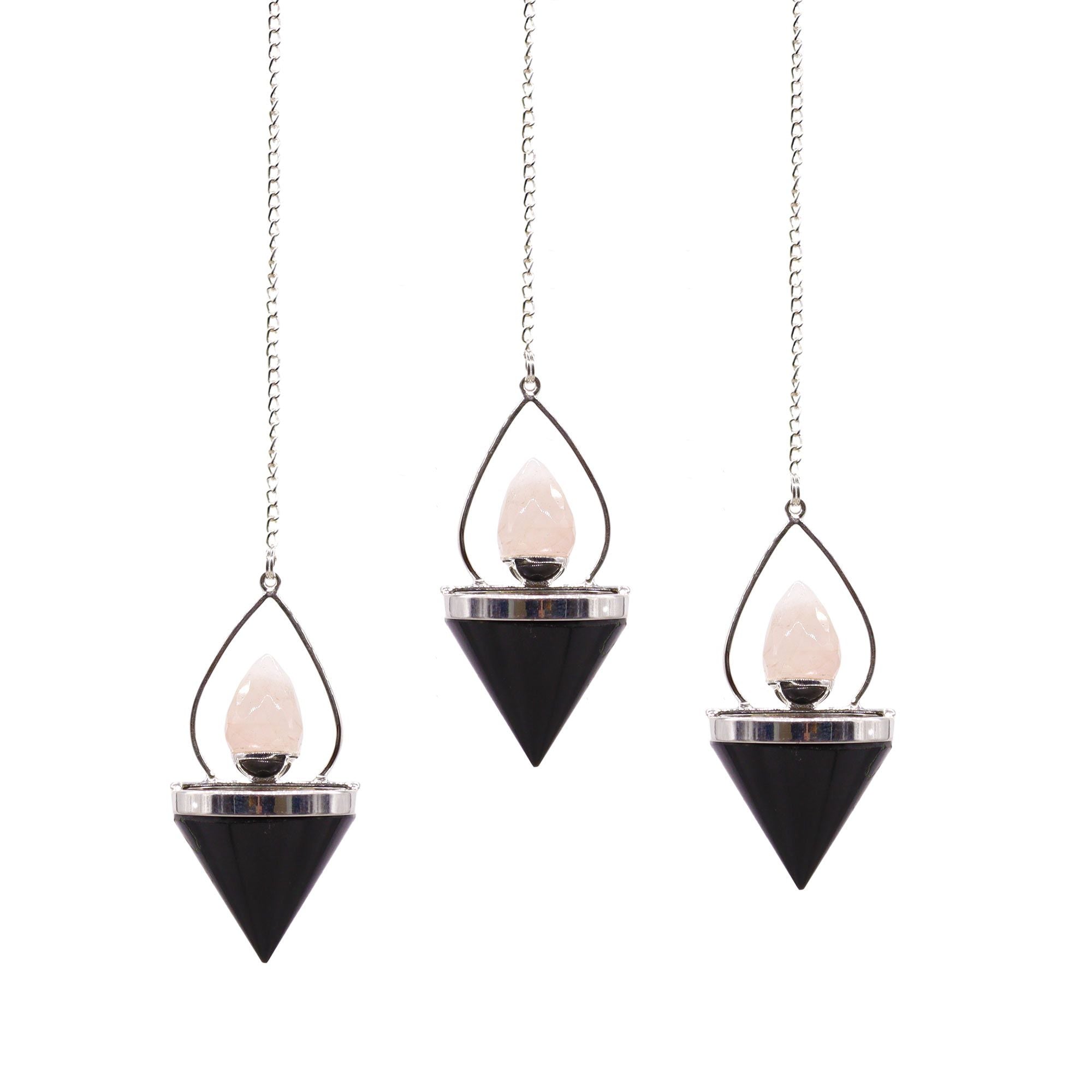 Three hanging candle holders with black and silver design on a white background