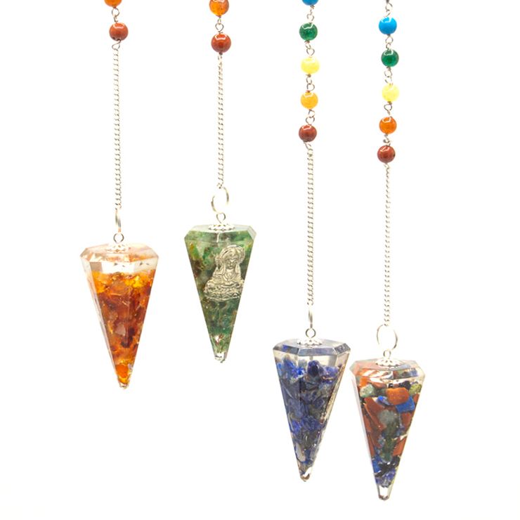 Four triangular crystal pendulums with colorful beads on a white background
