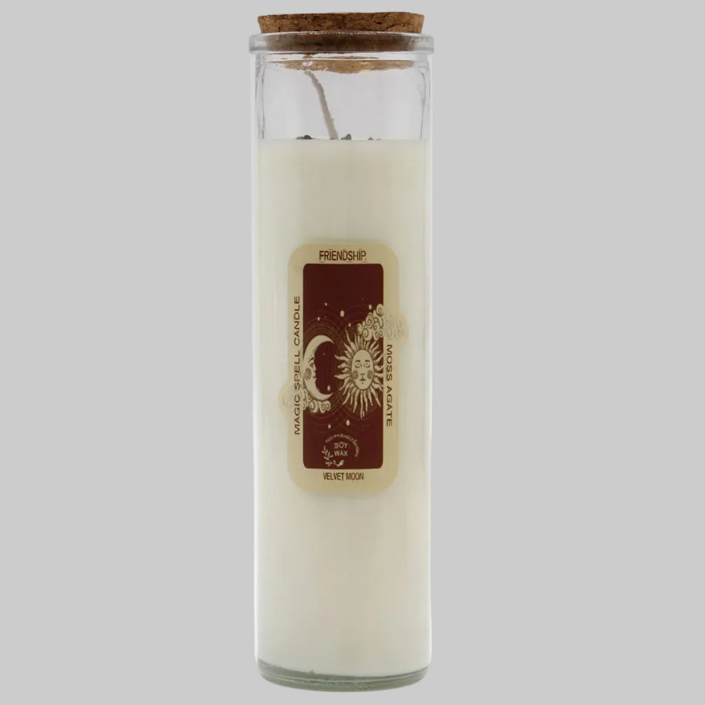 Glass candle with a cork lid and label on a white background