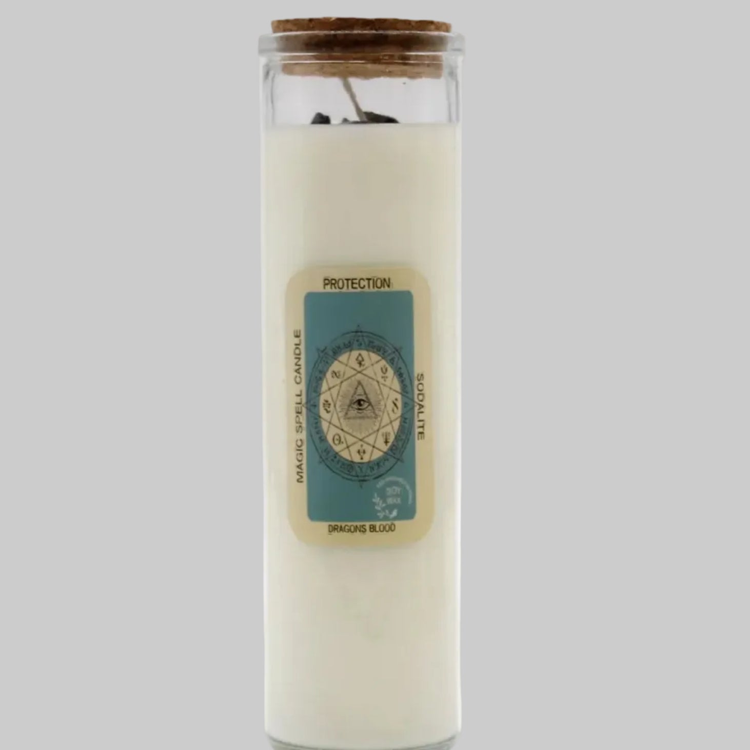 Glass candle with a label on a white background