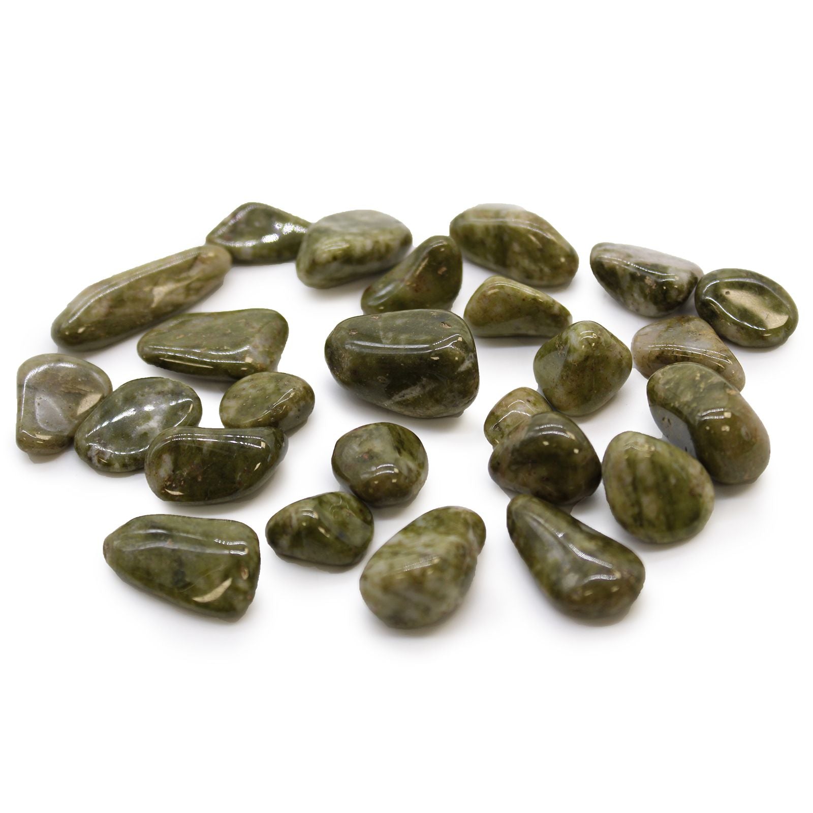 Green stones on a white background