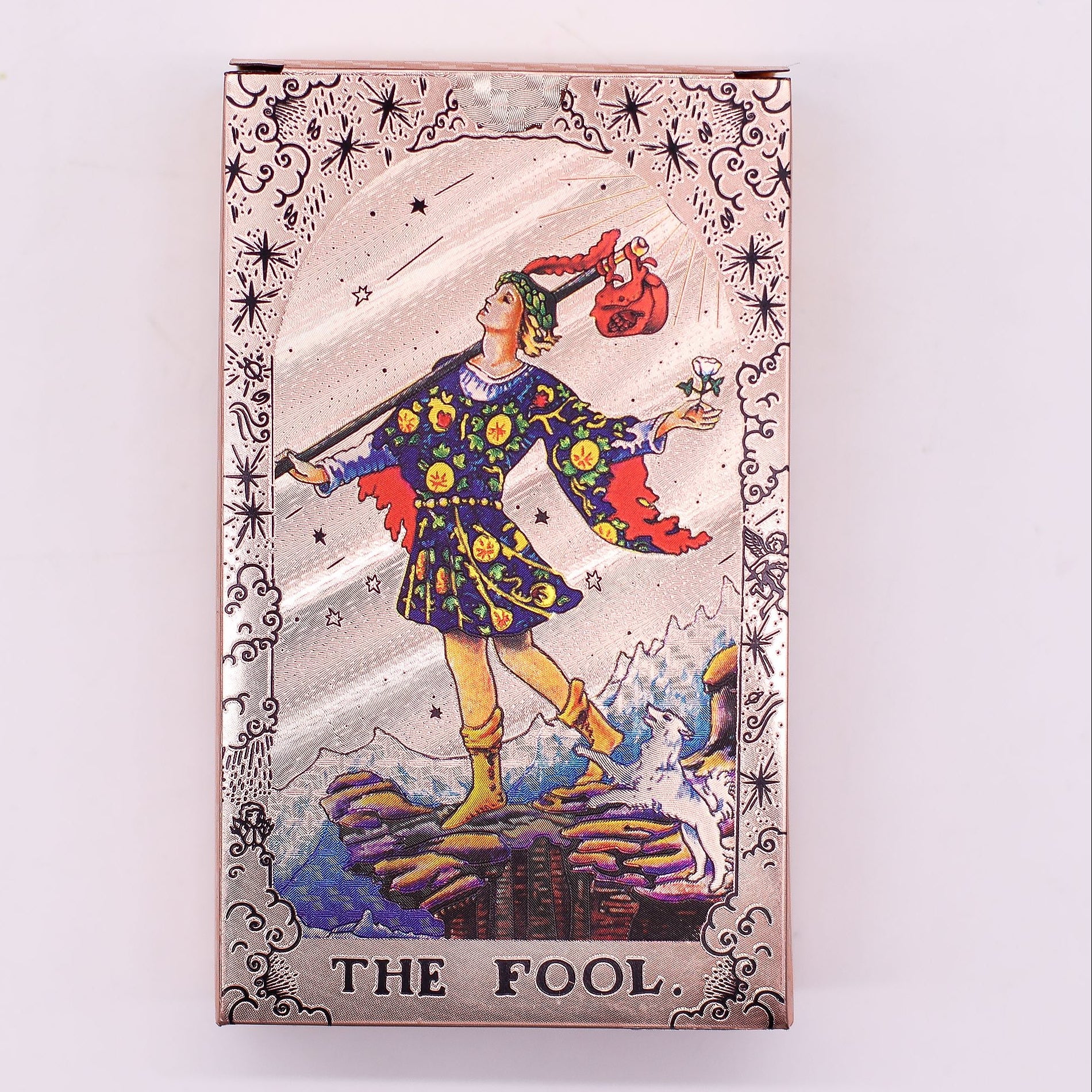 Card featuring 'The Fool' from a tarot deck on a white background