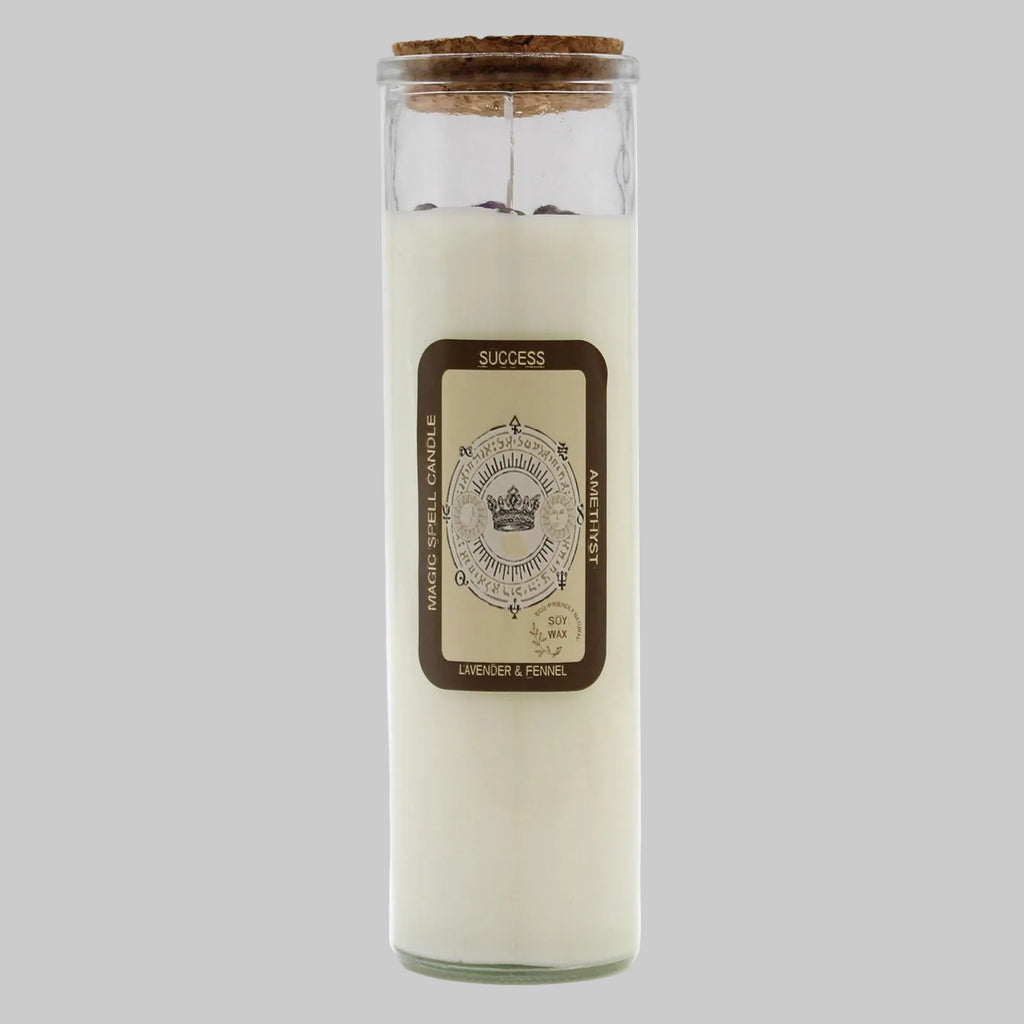 Glass candle with a cork lid and label on a white background