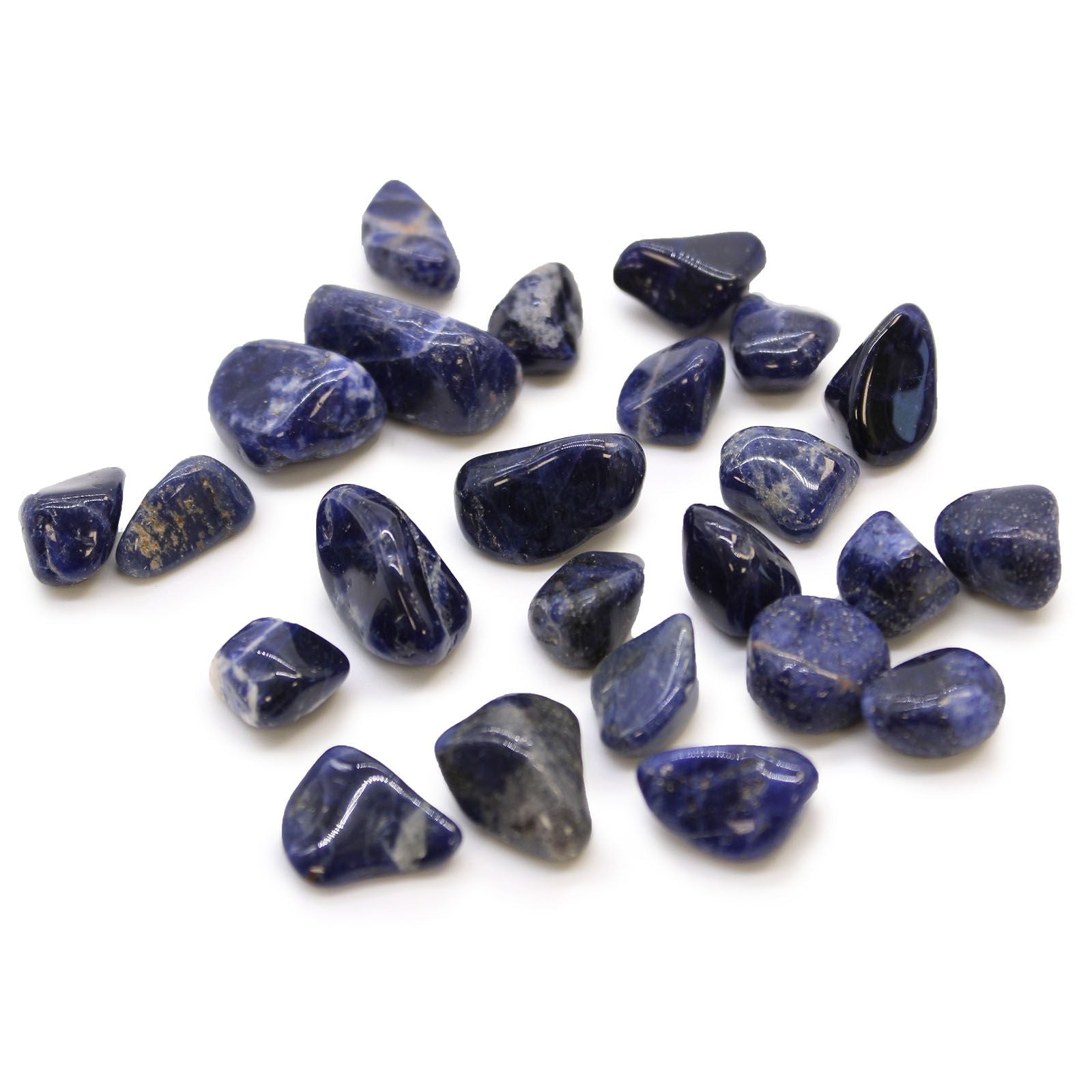 Collection of blue stones on a white background