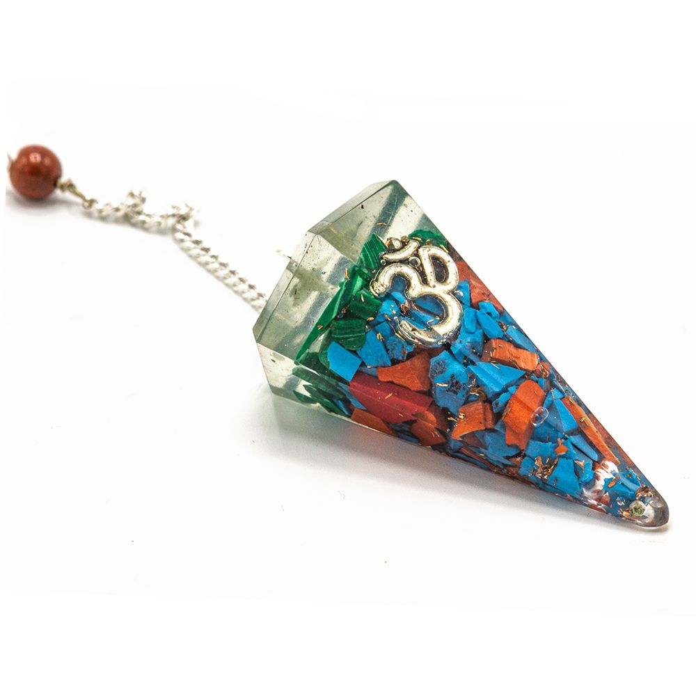 Decorative crystal pendant with colorful stones and 'OM' symbol on a white background