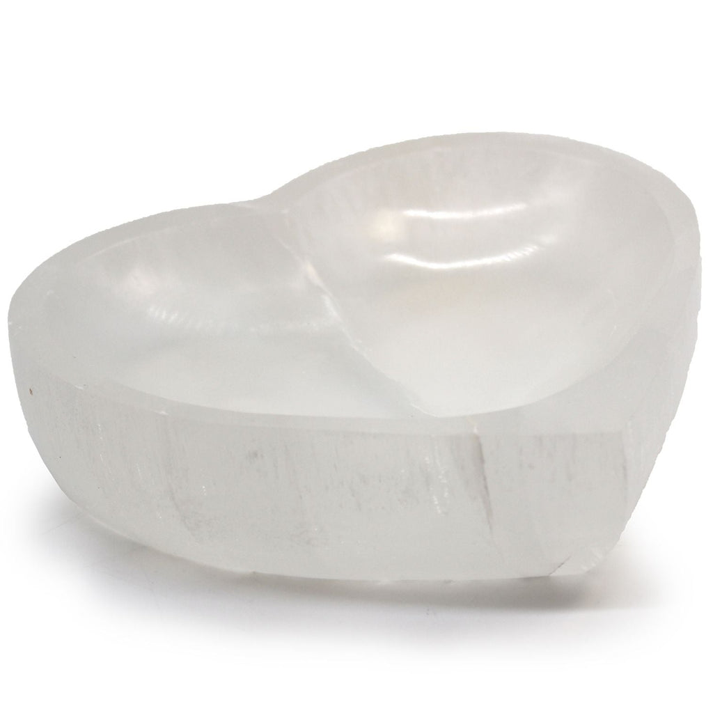 White stone sculpture on a white background