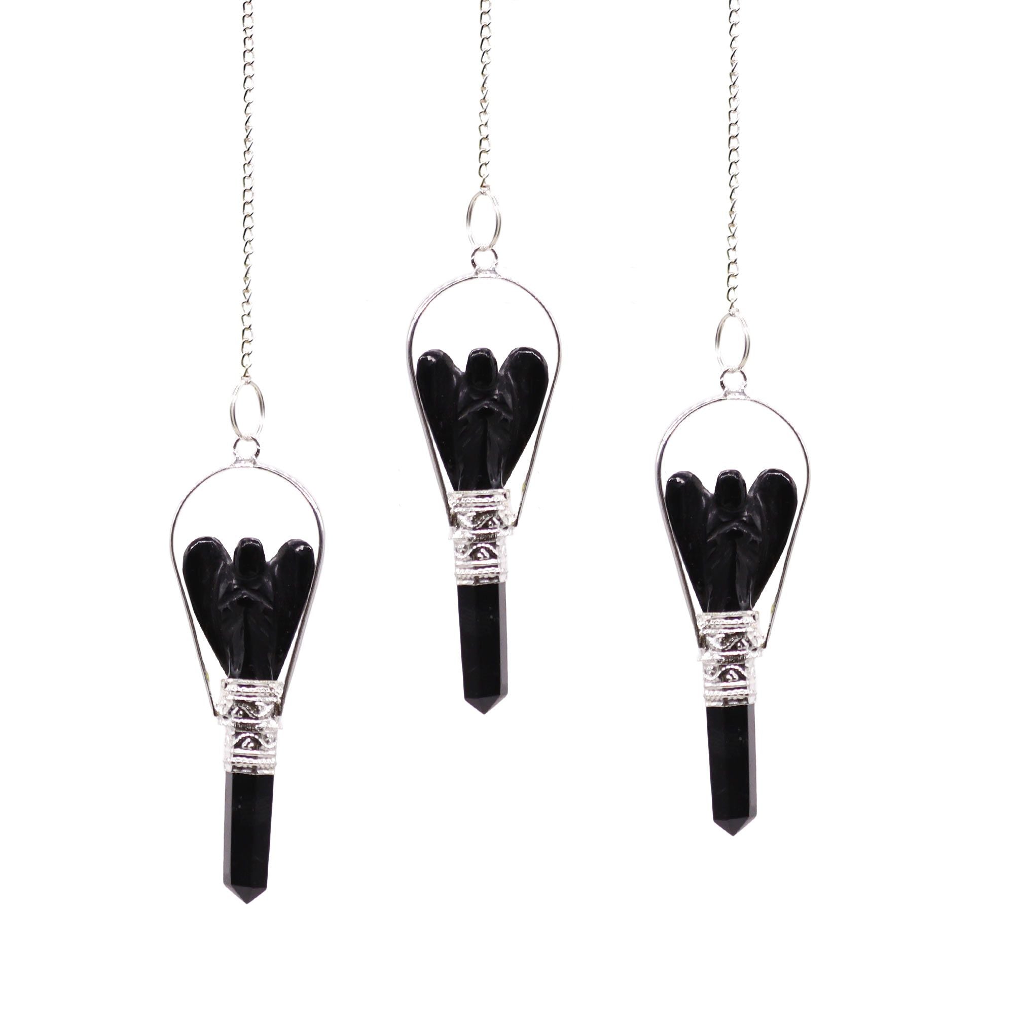 Three black winged objects in clear containers on white background