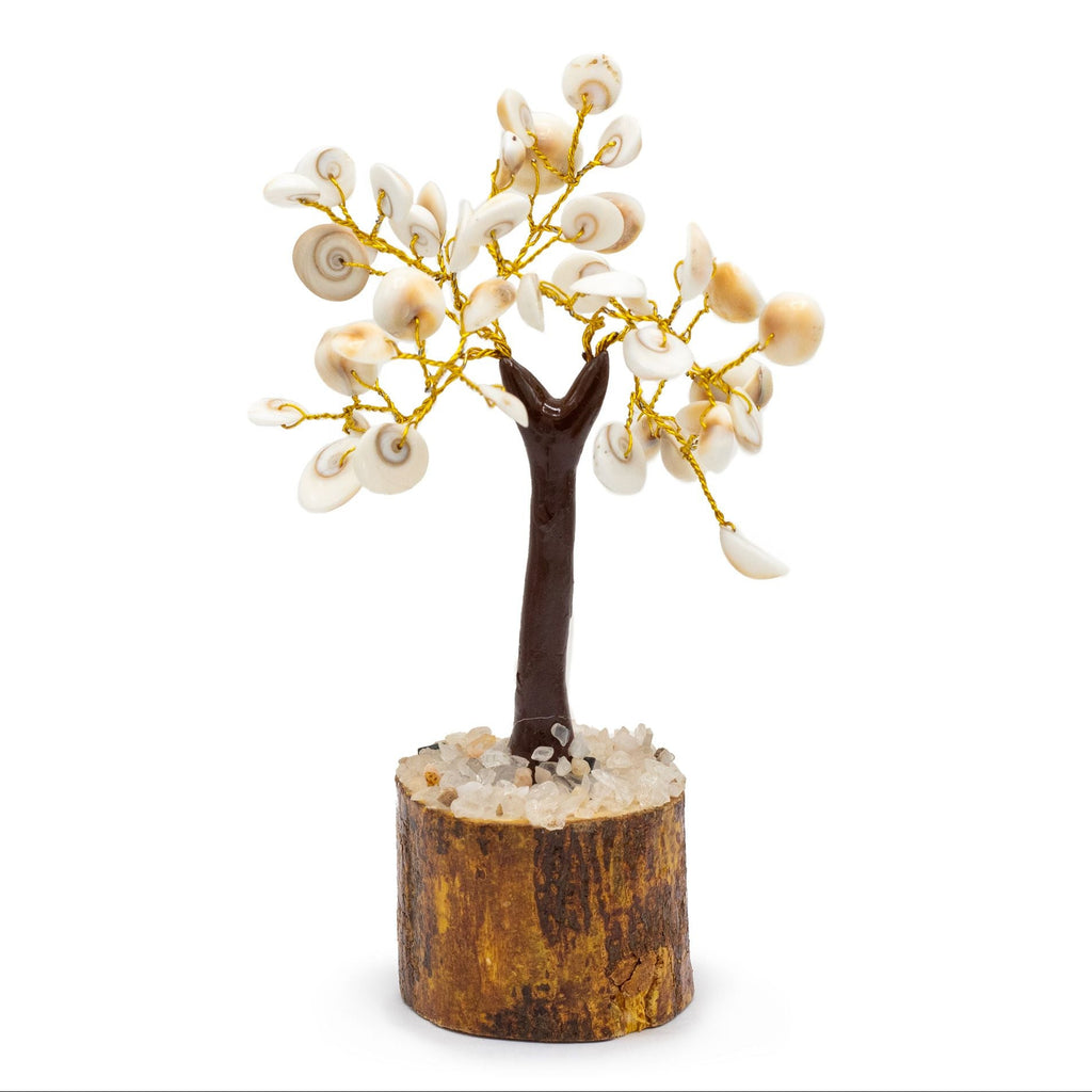 Decorative tree with white branches and gold accents on a wooden base against a white background