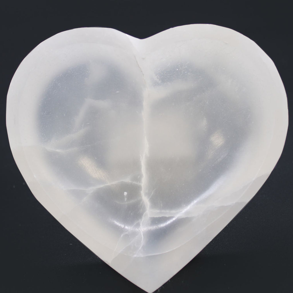 Heart-shaped silicone mold on a black background