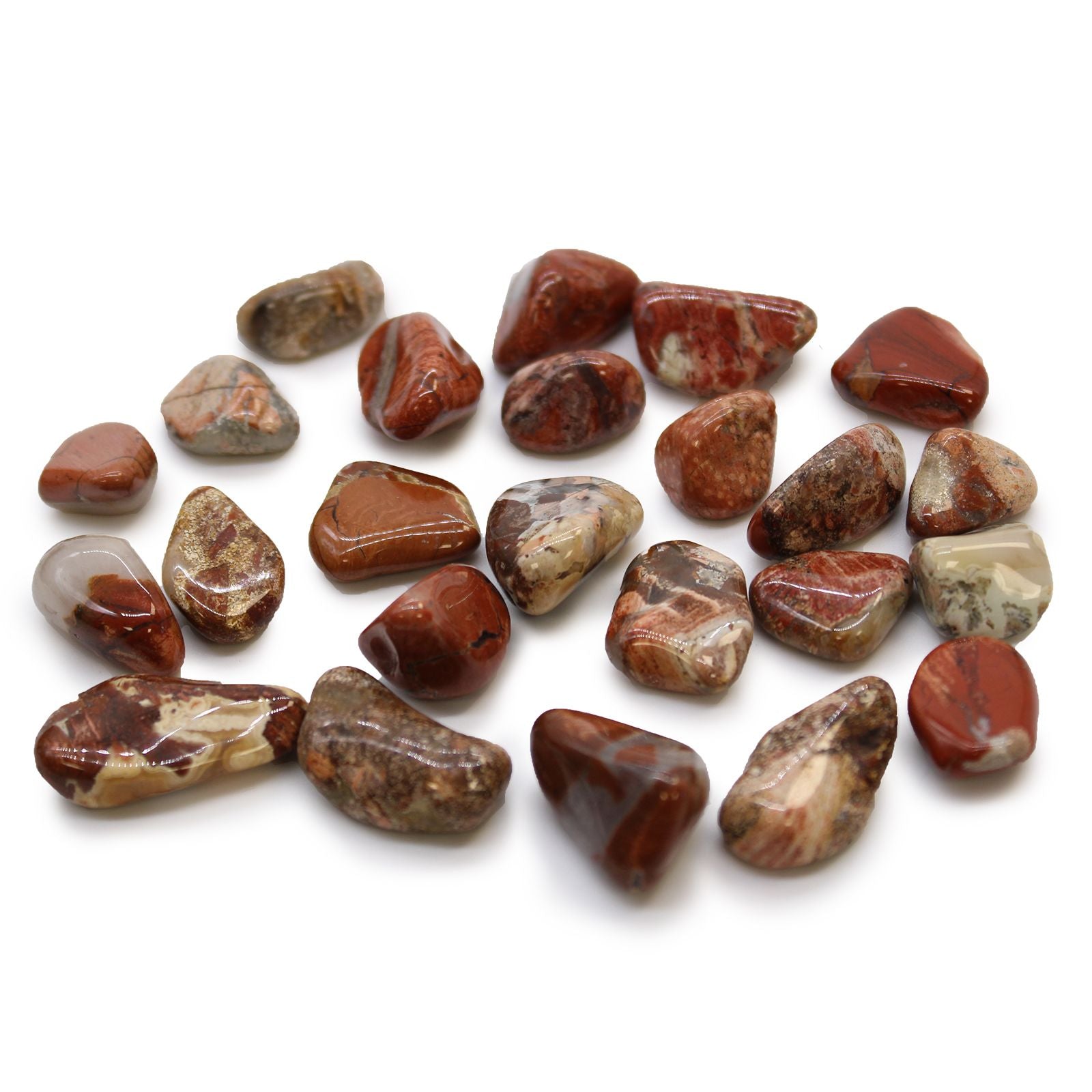Collection of polished gemstones on a white background