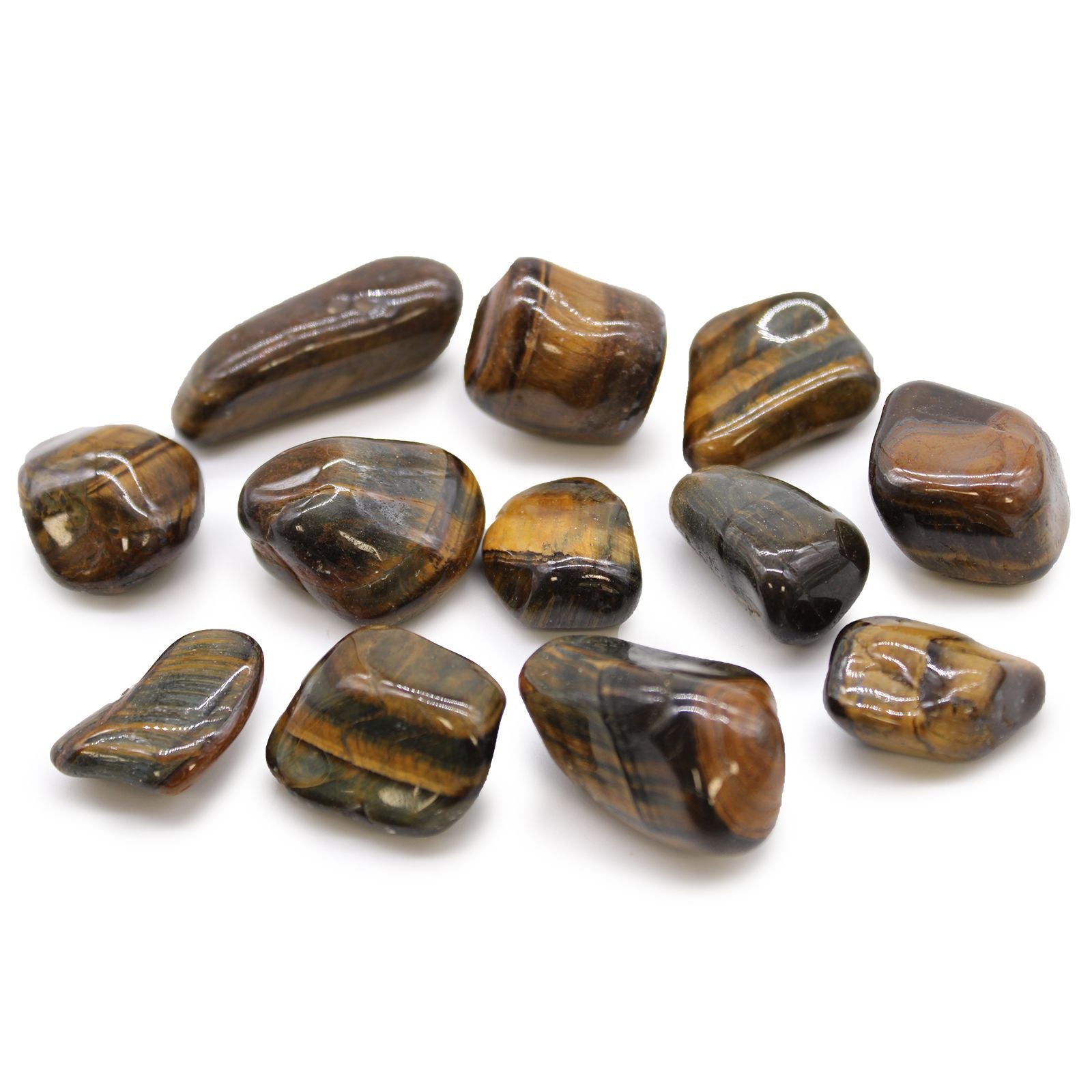 Tumbled tiger eye stones on a white background