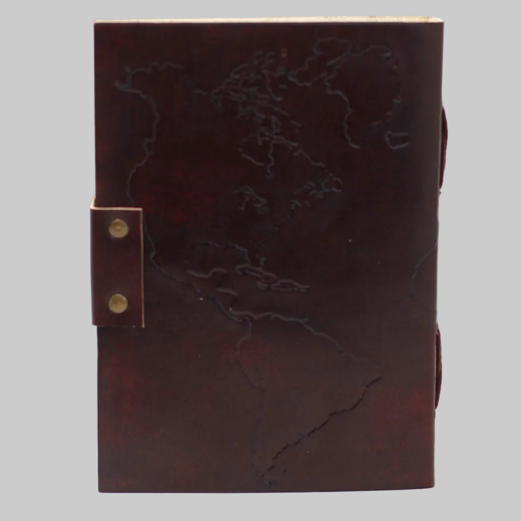 Brown leather notebook with embossed design on a white background