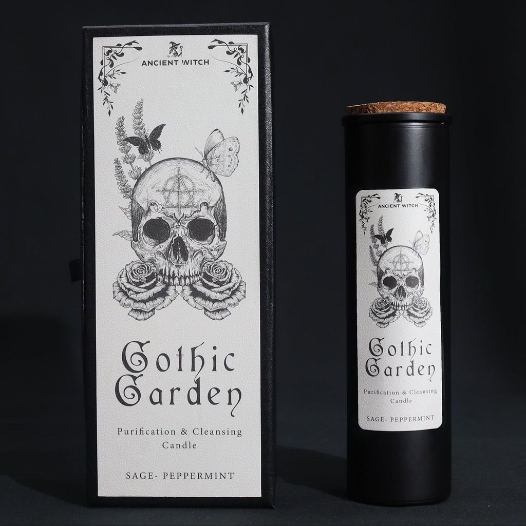 Gothic Garden candle packaging with skull and floral design on a black background