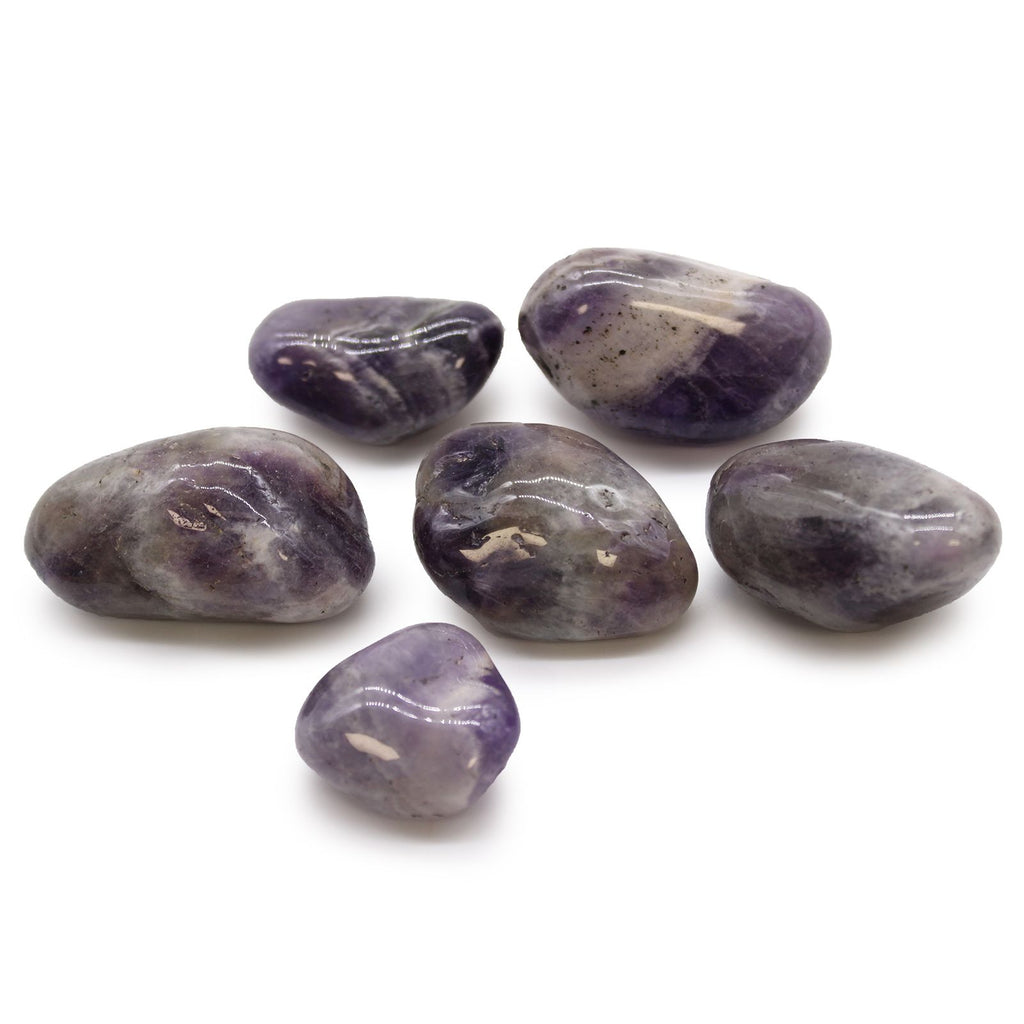 Purple stones on a white background