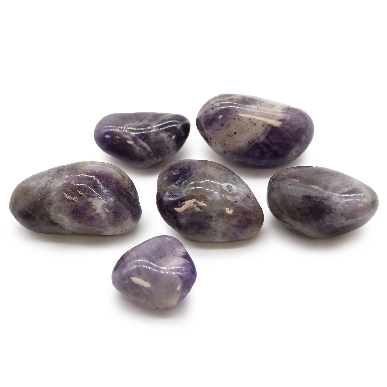 Purple stones on a white background