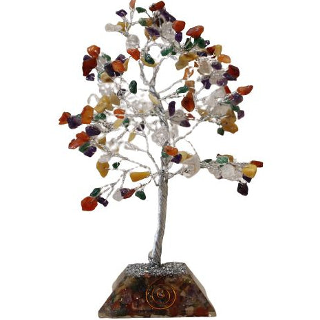 Crystal tree with multicolored stones on a white background
