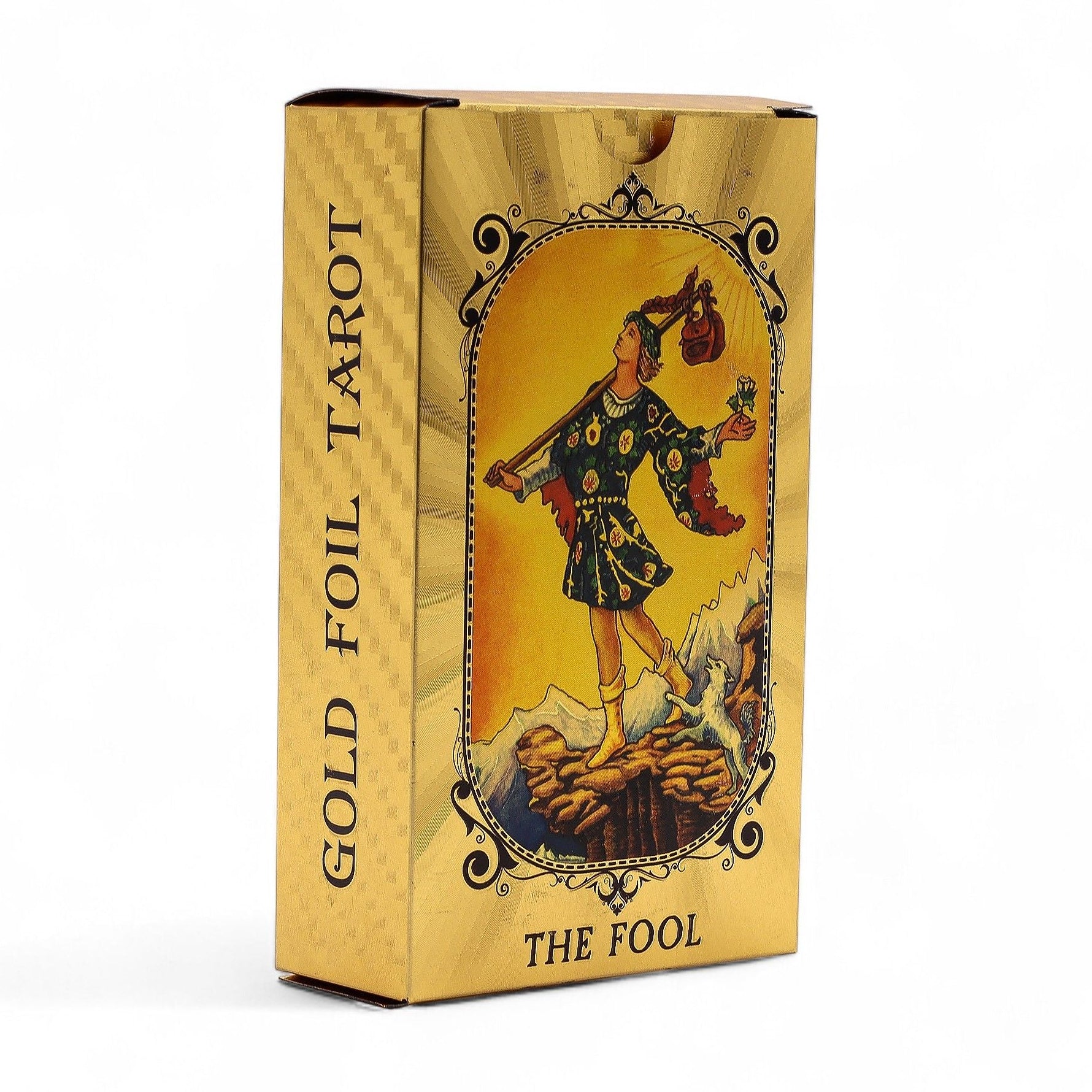 Gold foil Tarot card box with 'The Fool' illustration on a white background