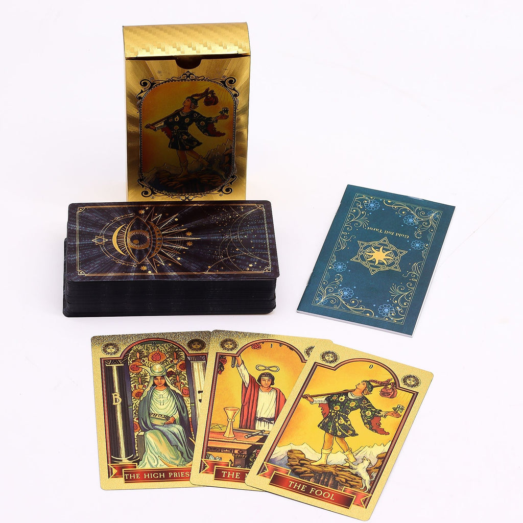 Collection of tarot cards with decorative box and card on a white background