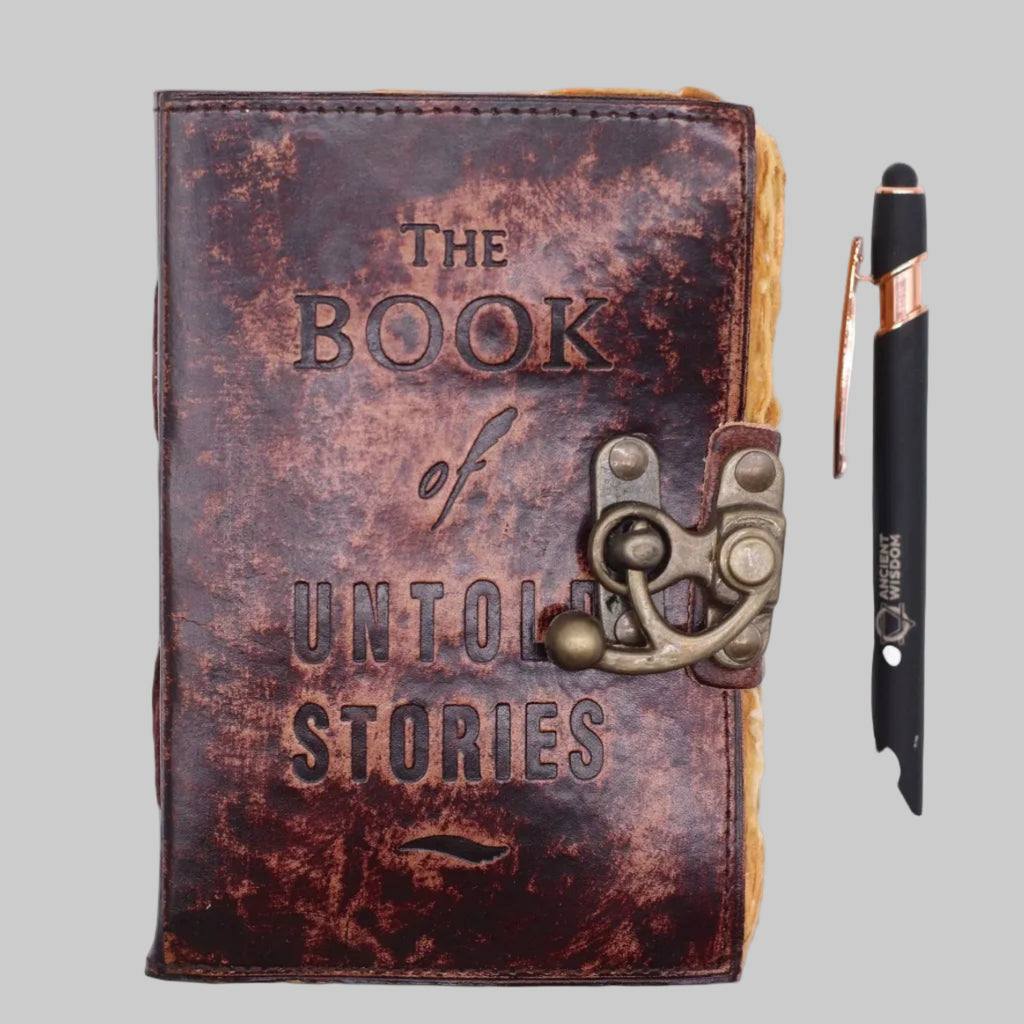 Leather-bound book titled 'The Book of Untold Stories' with a pen on a white background