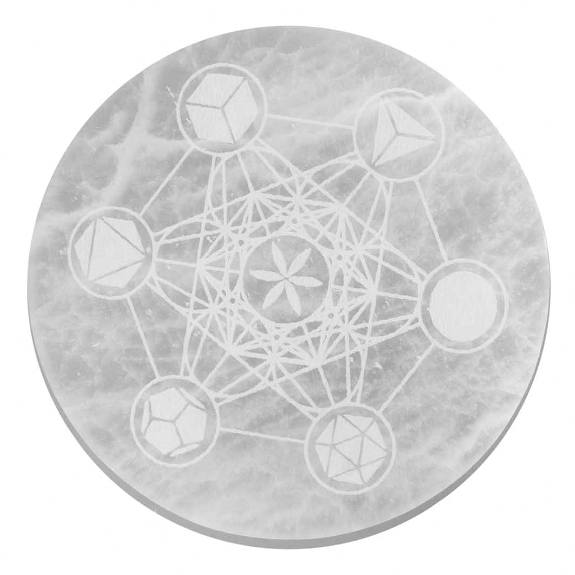 Round stone with geometric etchings on a white background