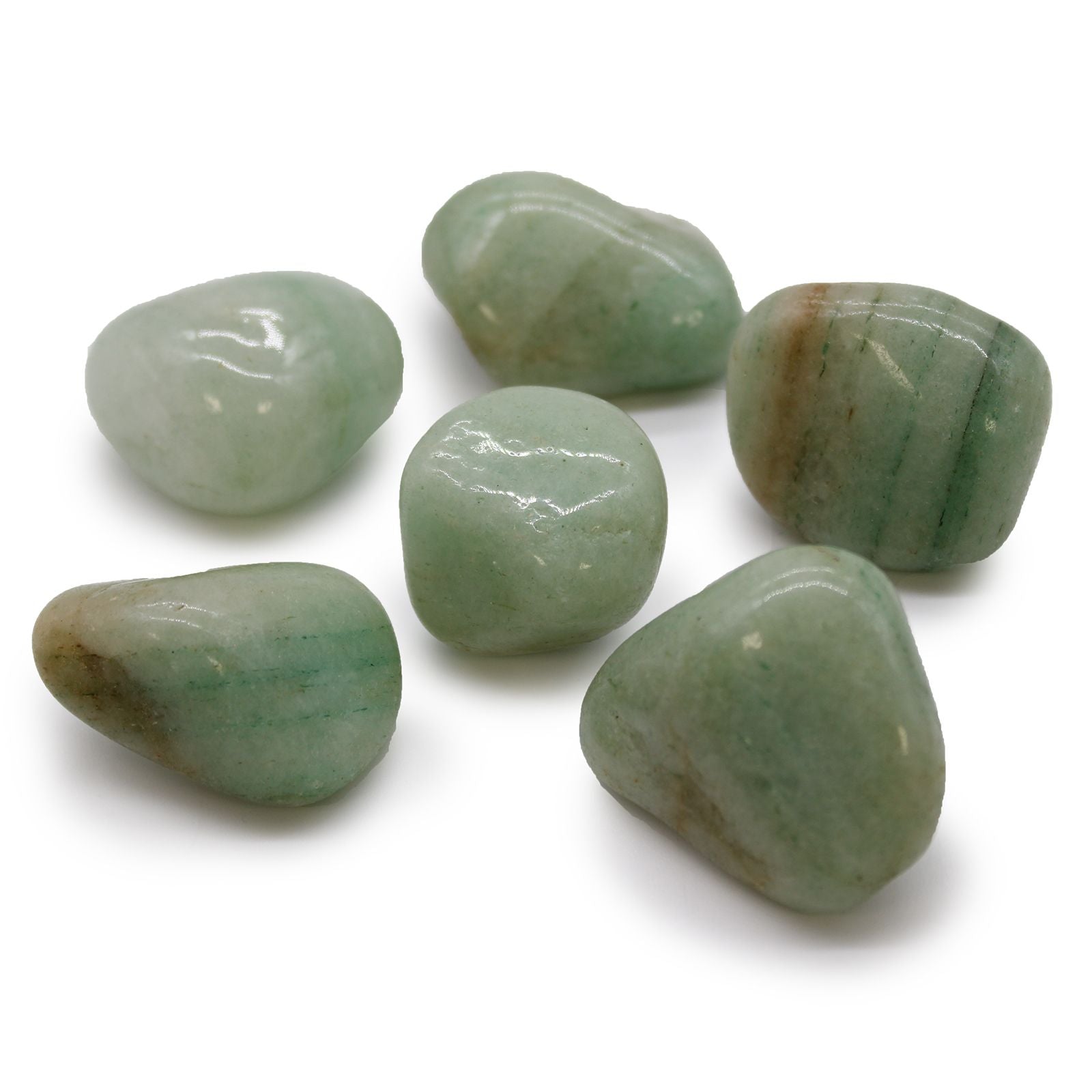 Green stones on a white background