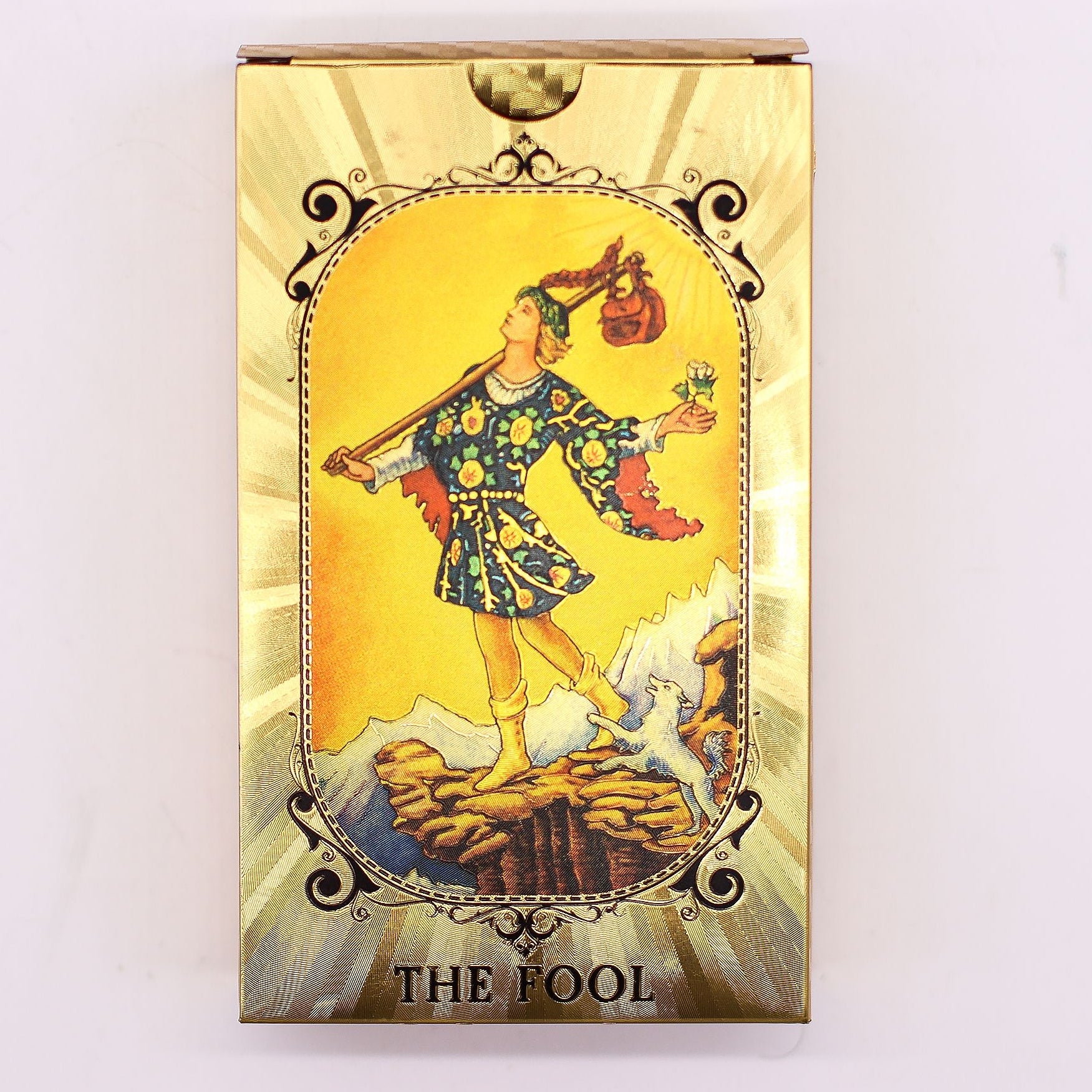 Card featuring 'The Fool' from a tarot card deck on a white background