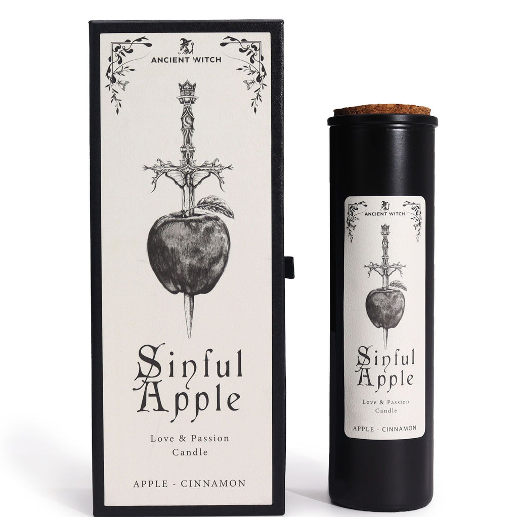 Candle packaging with 'Sinful Apple' label featuring an apple and sword design.