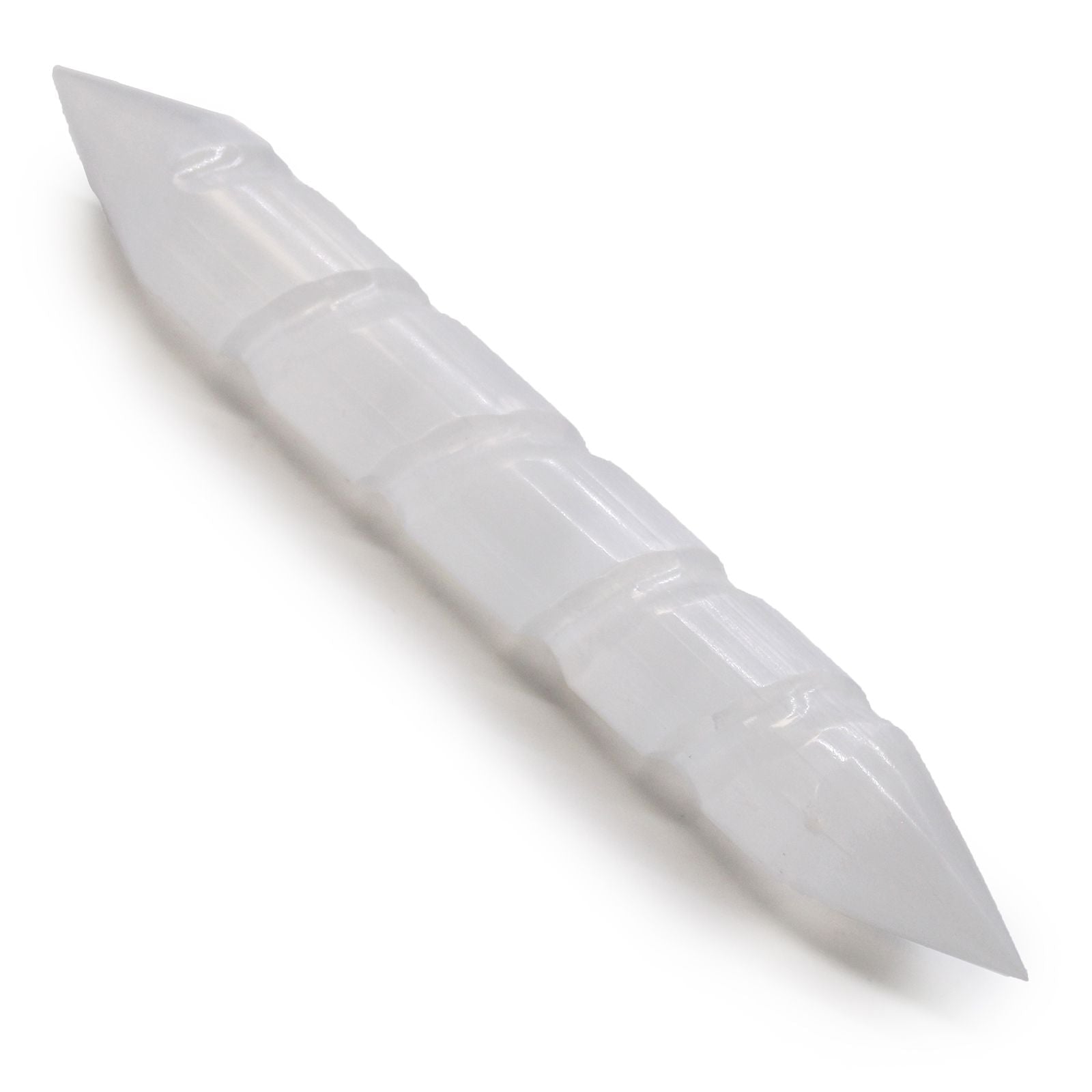 White plastic tool with a pointed tip on a white background