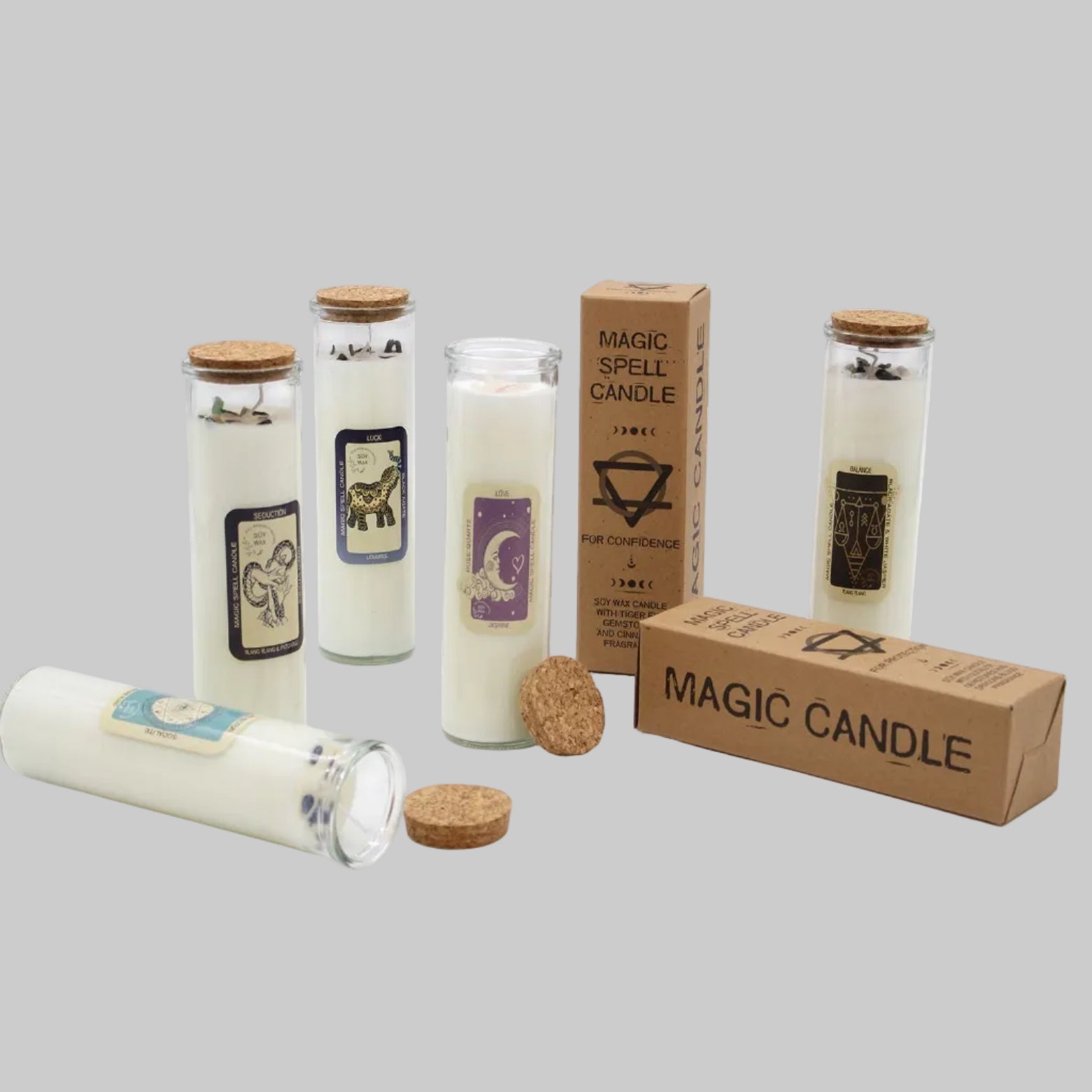 Set of magic candles with labels and packaging on a white background
