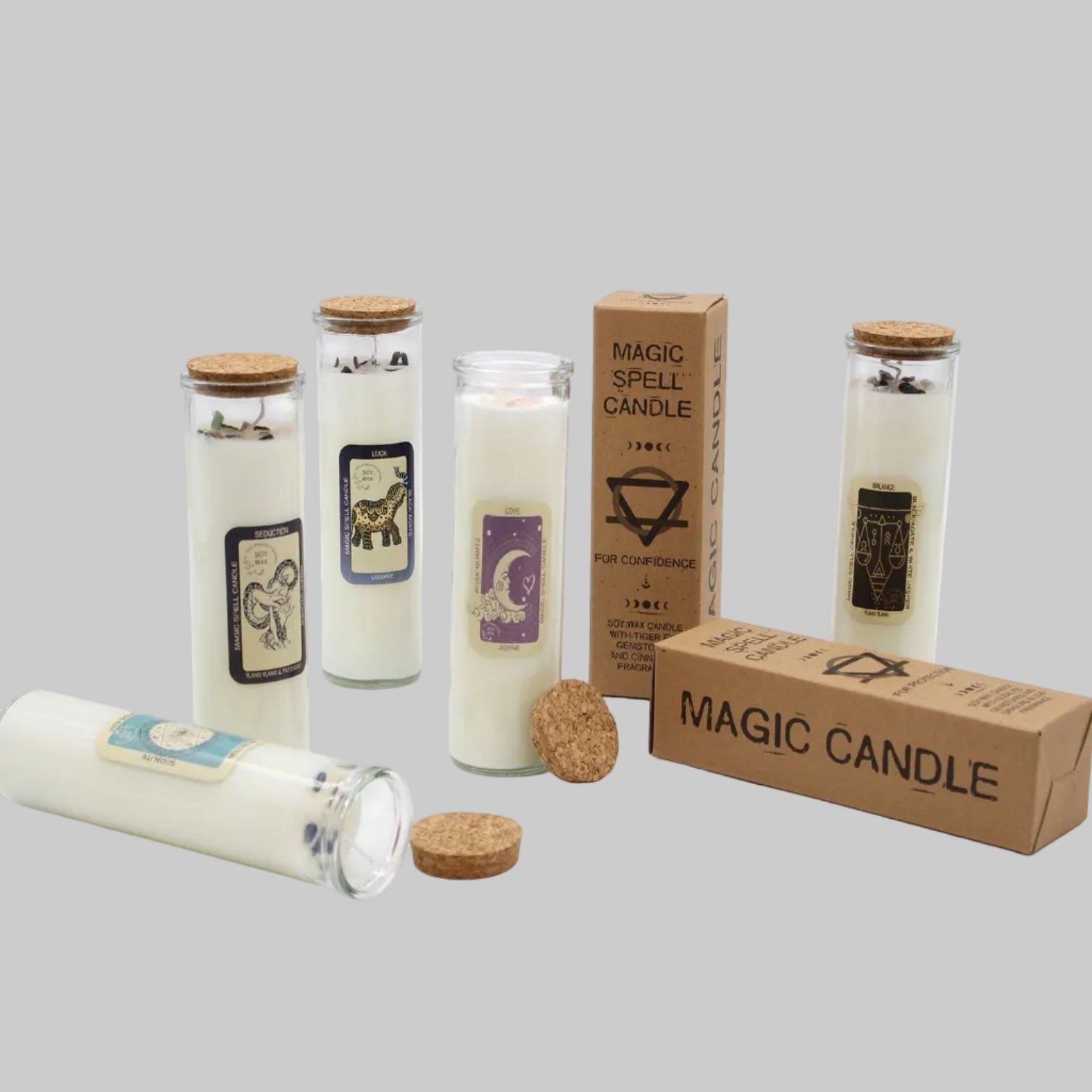 Set of magic candles with labels and packaging on a white background