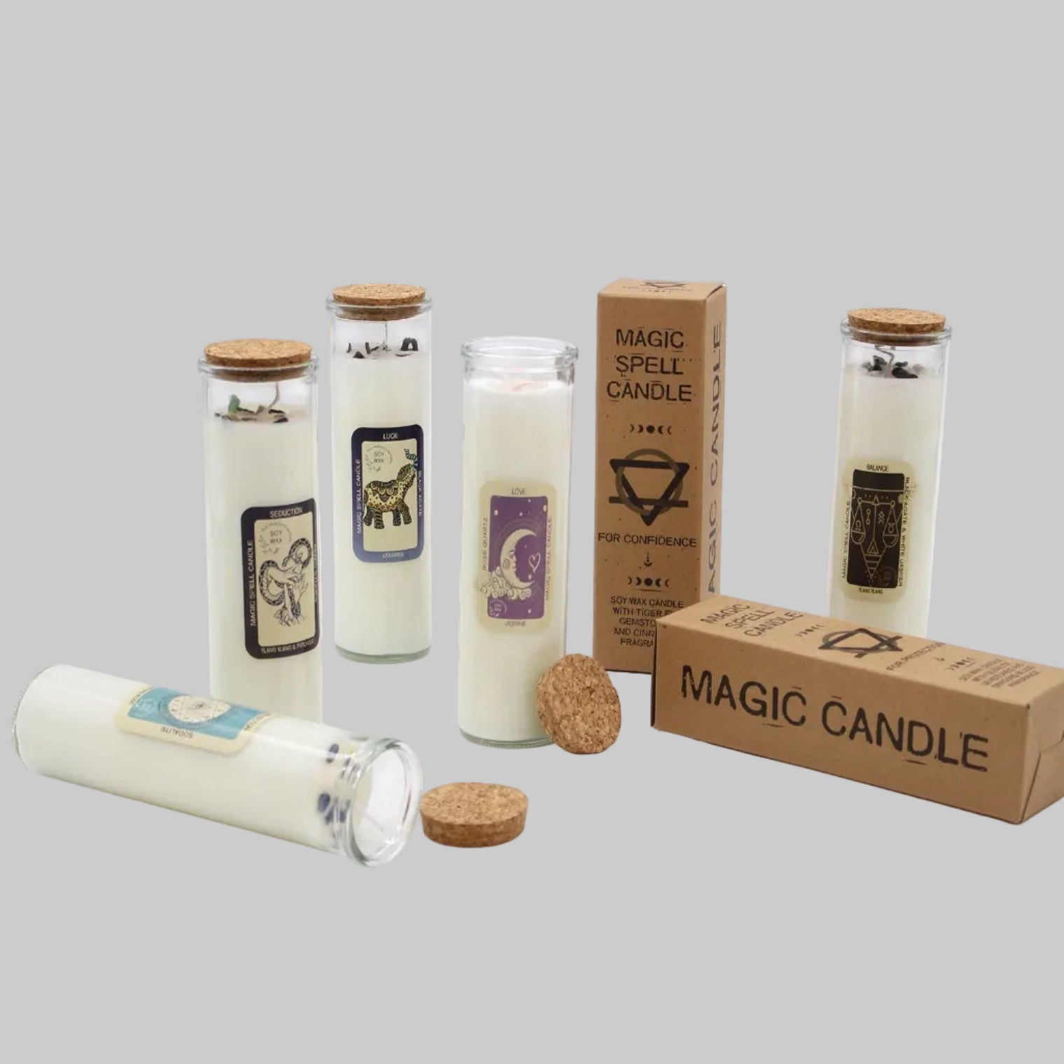 Set of magic candles with labels and packaging on a white background