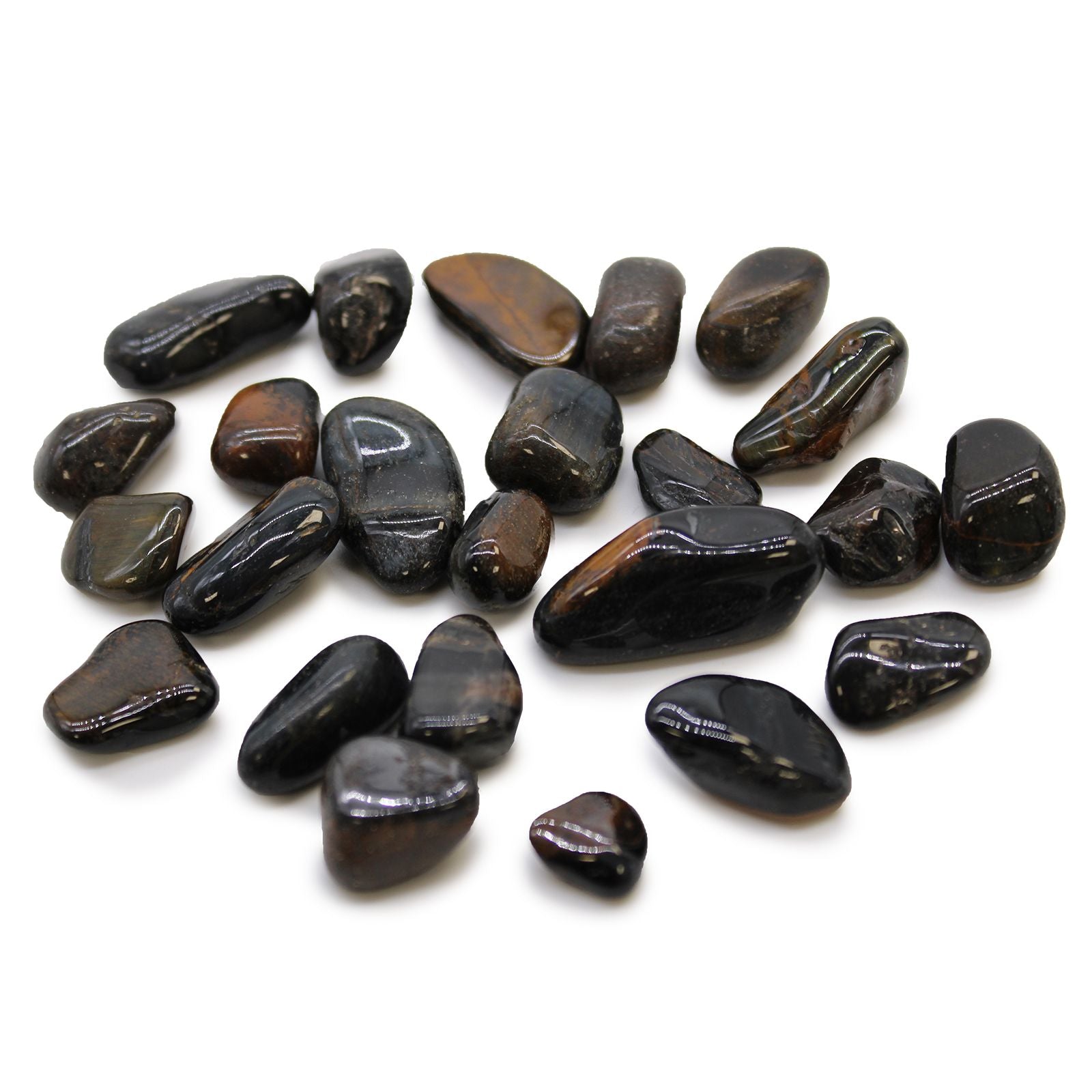 Collection of dark brown stones on a white background