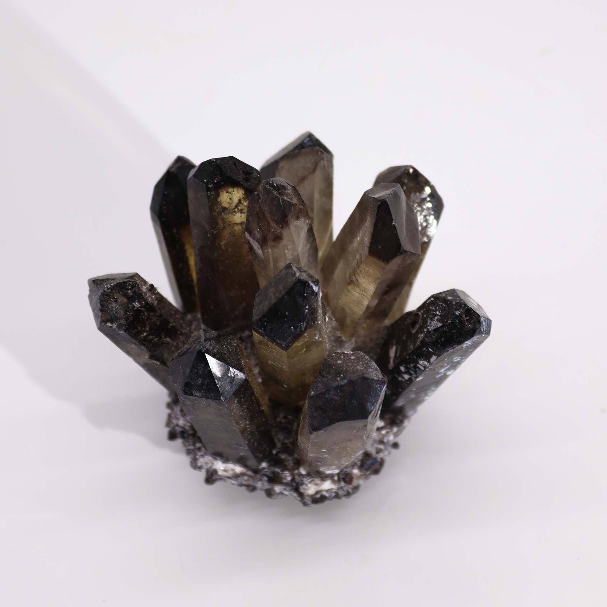 Smoky crystal cluster on a white background